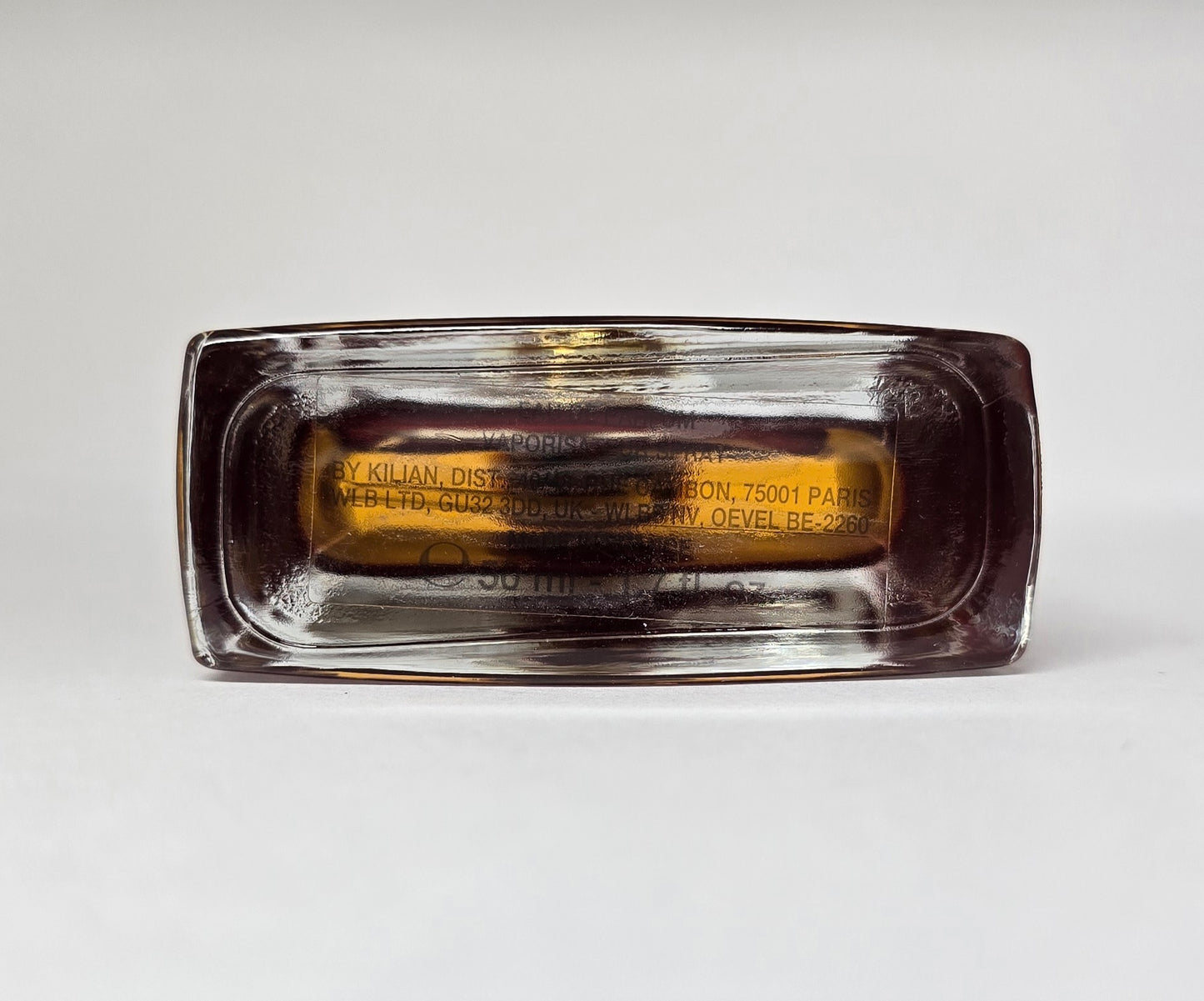 Rectangular glass container with branding on a white background