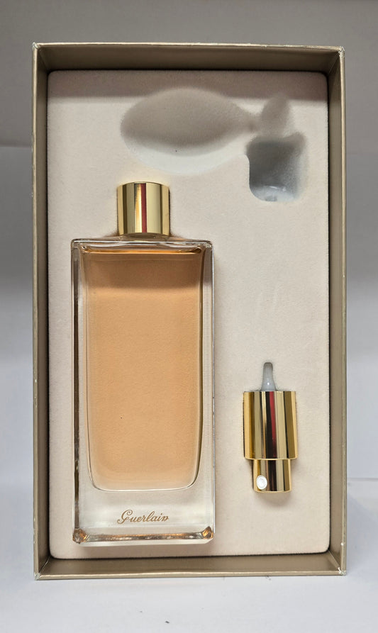 Perfume set with a bottle and a smaller container in a box