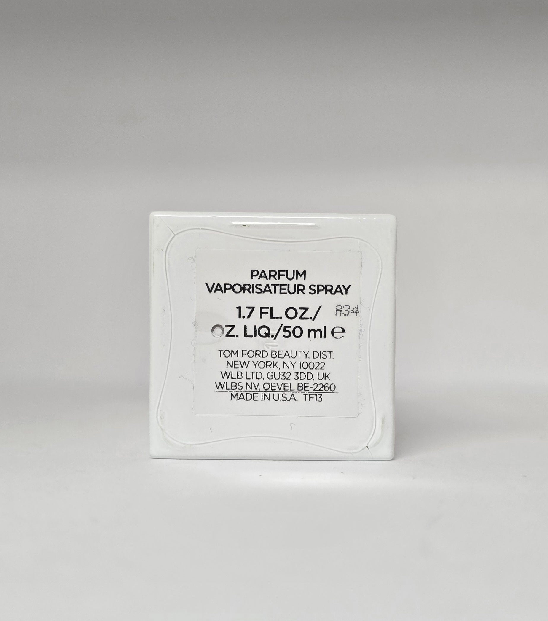 Tom Ford parfum packaging on a gray background