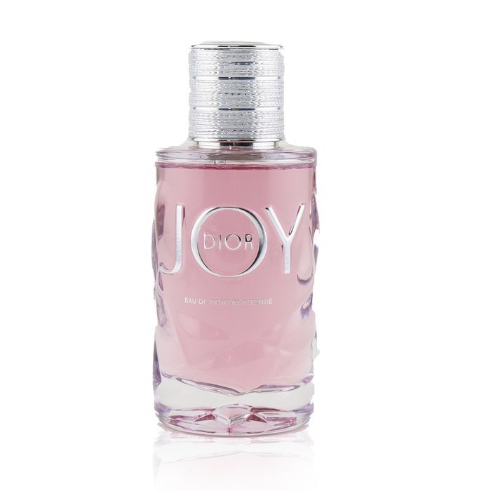 Dior JOY perfume bottle on a white background