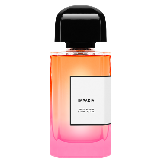 Perfume bottle with gradient design and 'Impadia' label on a white background