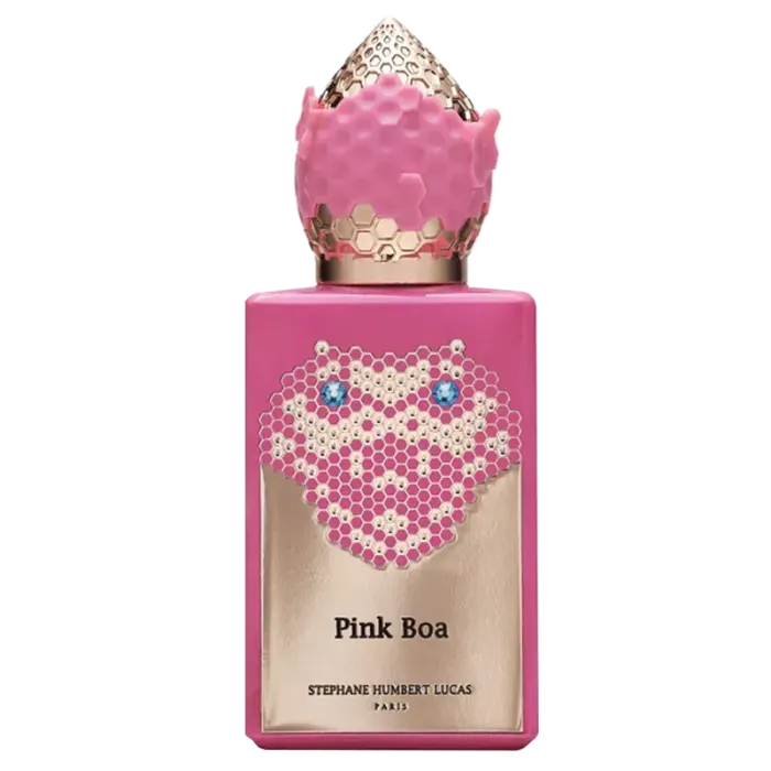 Pink perfume bottle with decorative cap on a white background